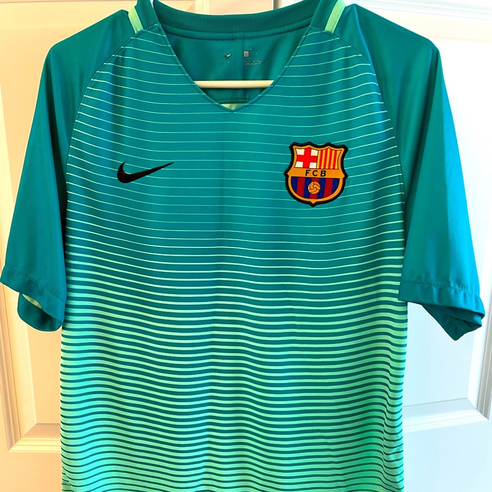 Men’s LARGE soccer shirt - worn once